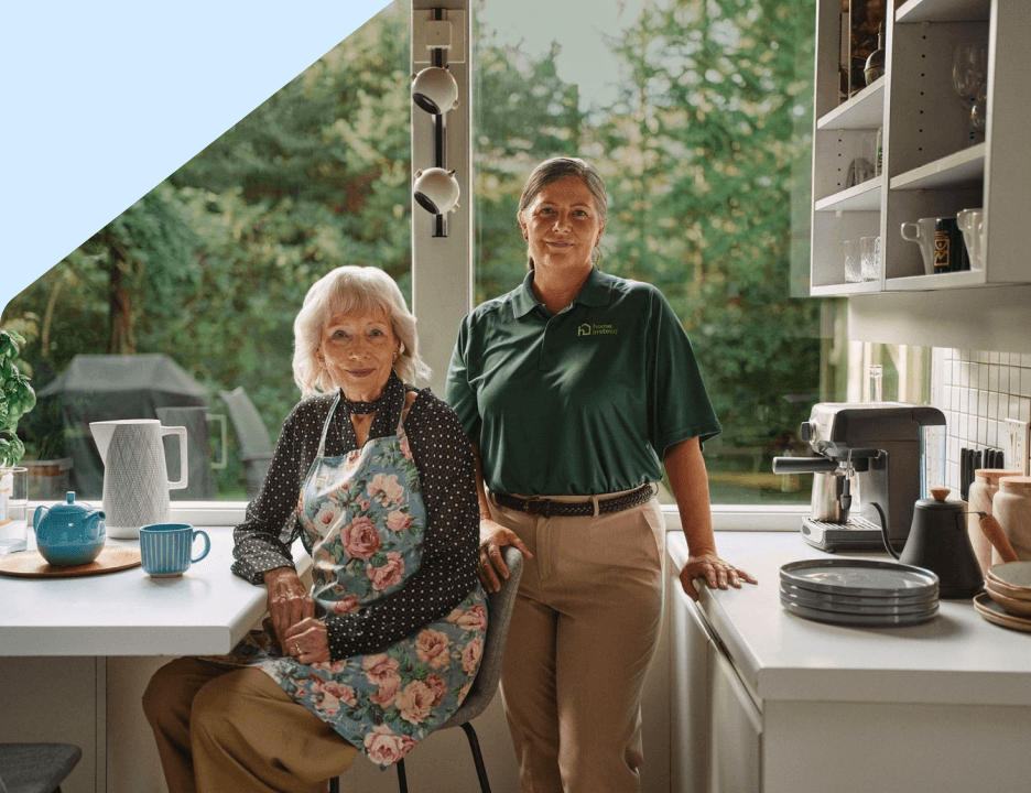 A Home Instead Care Pro with an adult.