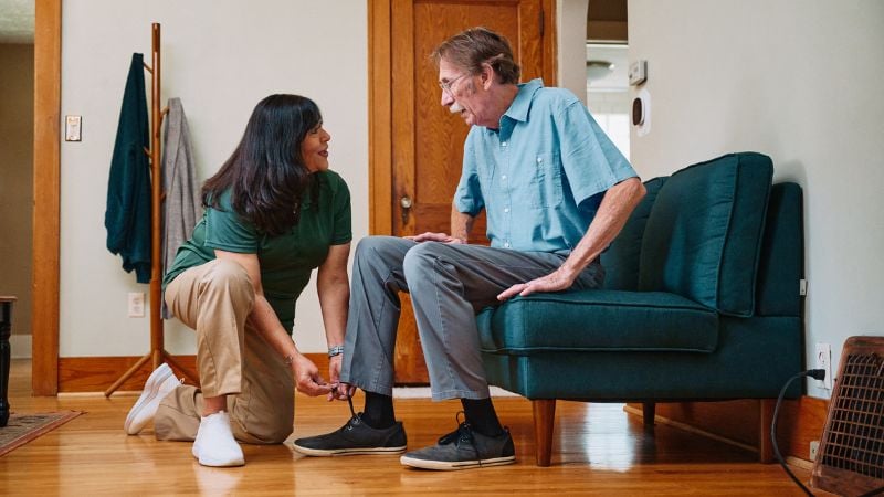 Home Instead caregiver and senior client