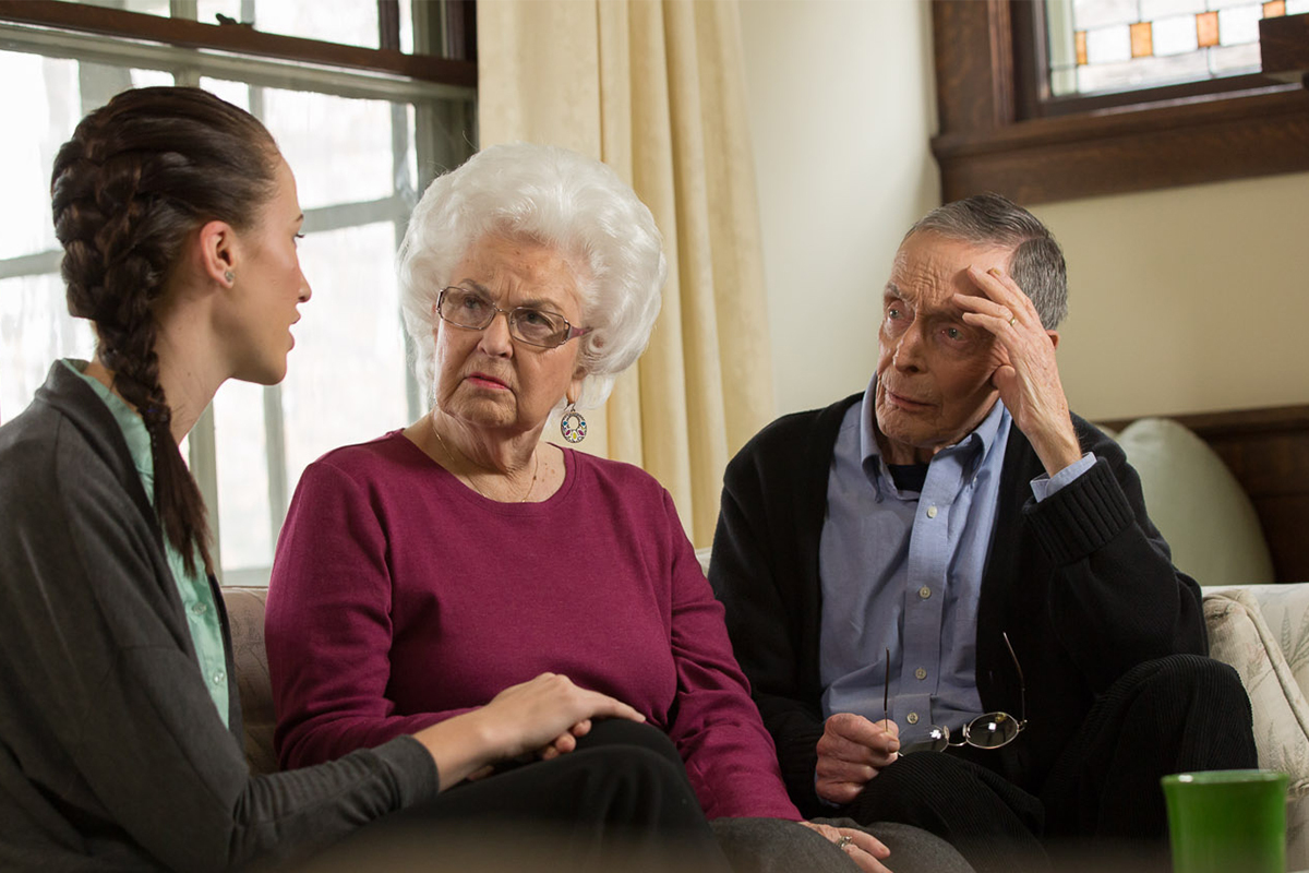 Daughter talking with mom and dad