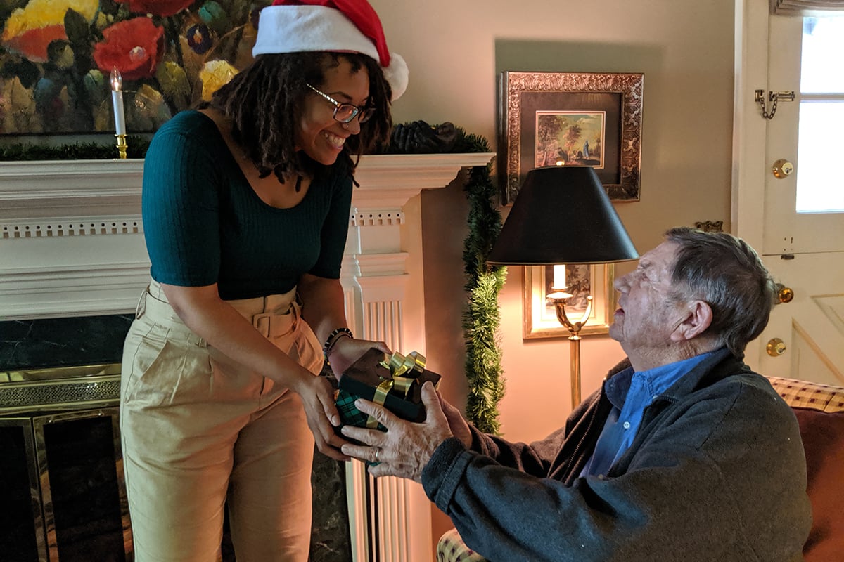 Gift being presented to a senior