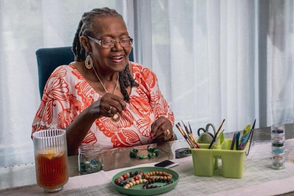 Woman with Arthritis eating