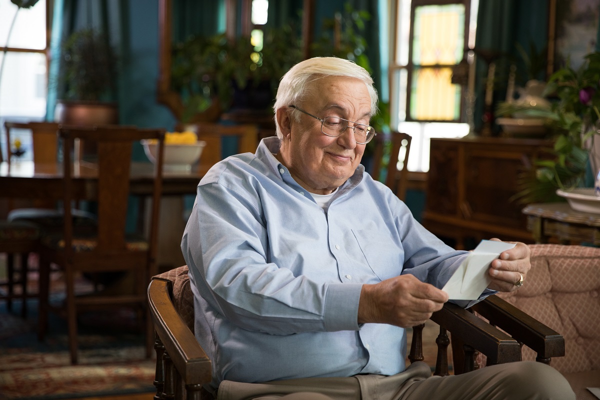 Senior reading a letter