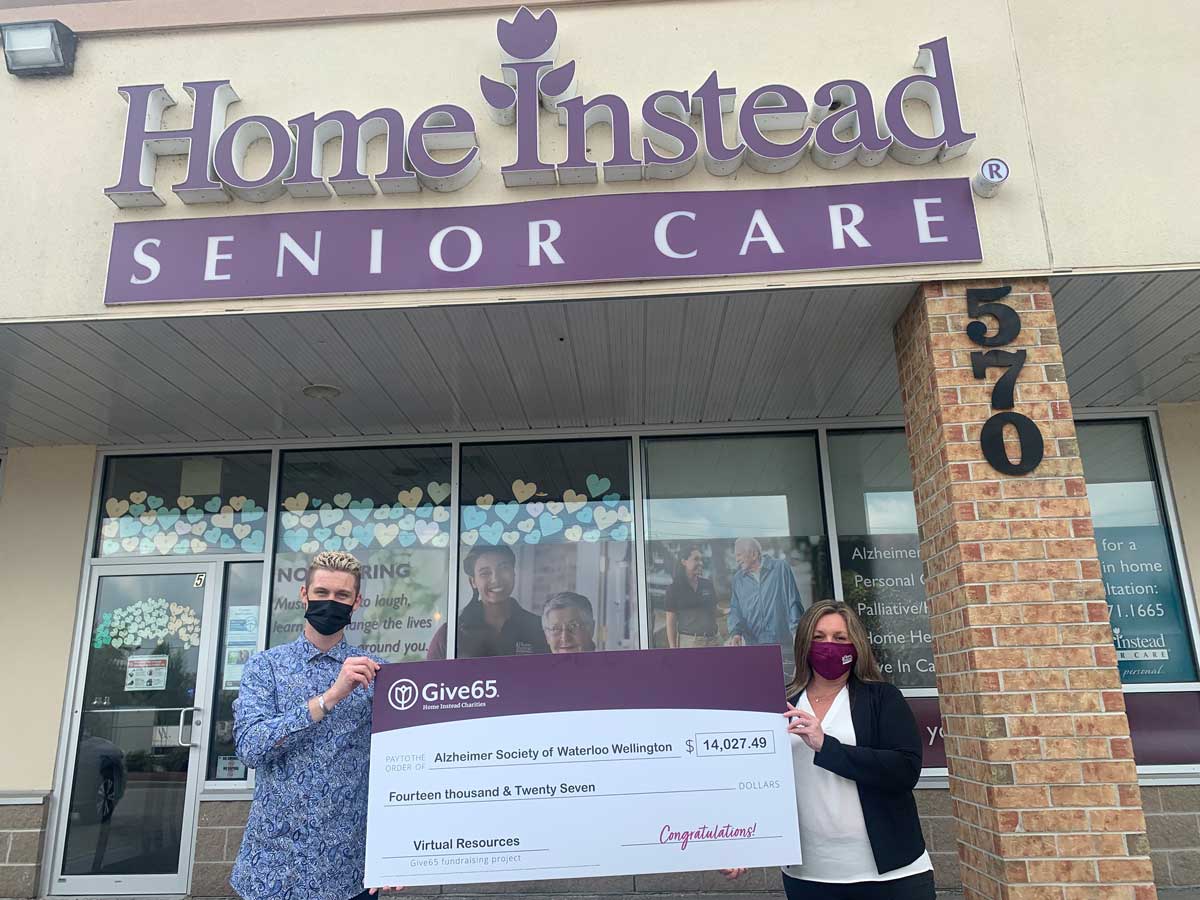 Home Instead Kitchener- Waterloo presenting a donation cheque to the Alzhemier's Society of Waterloo Wellington