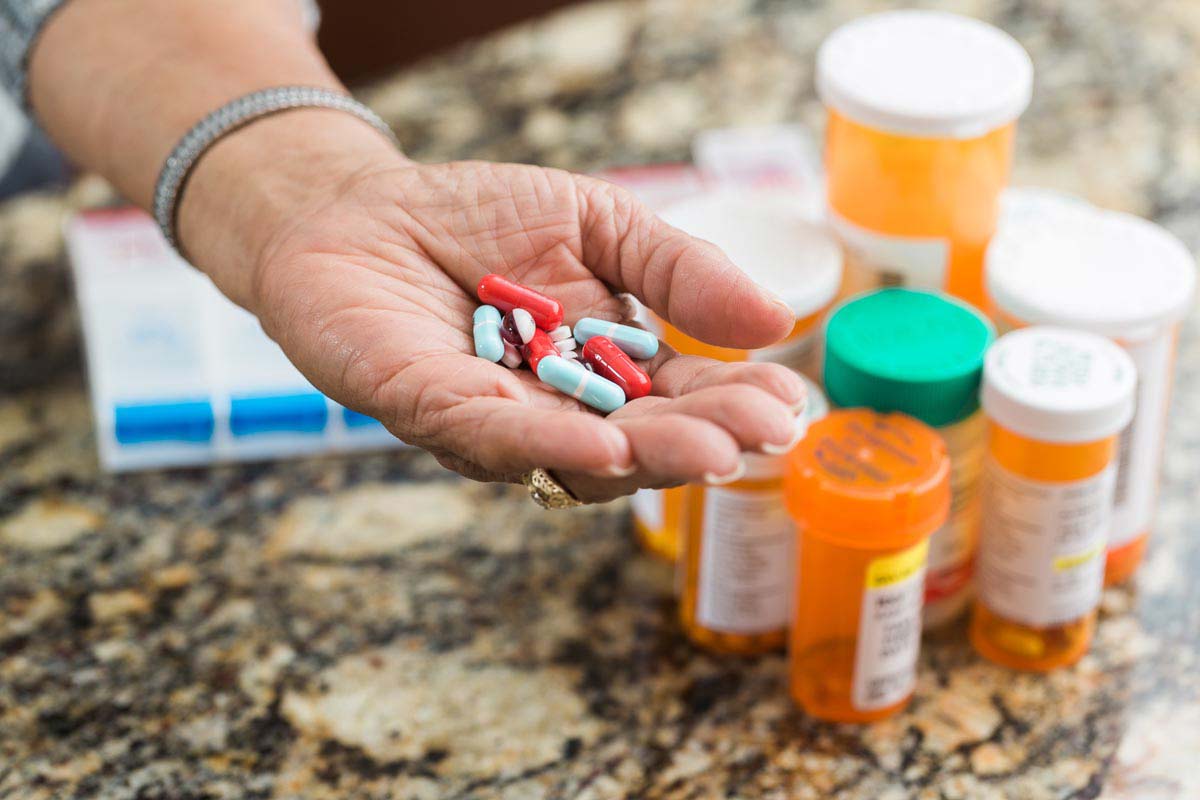 Home Instead Caregivers remind seniors of their medication schedule