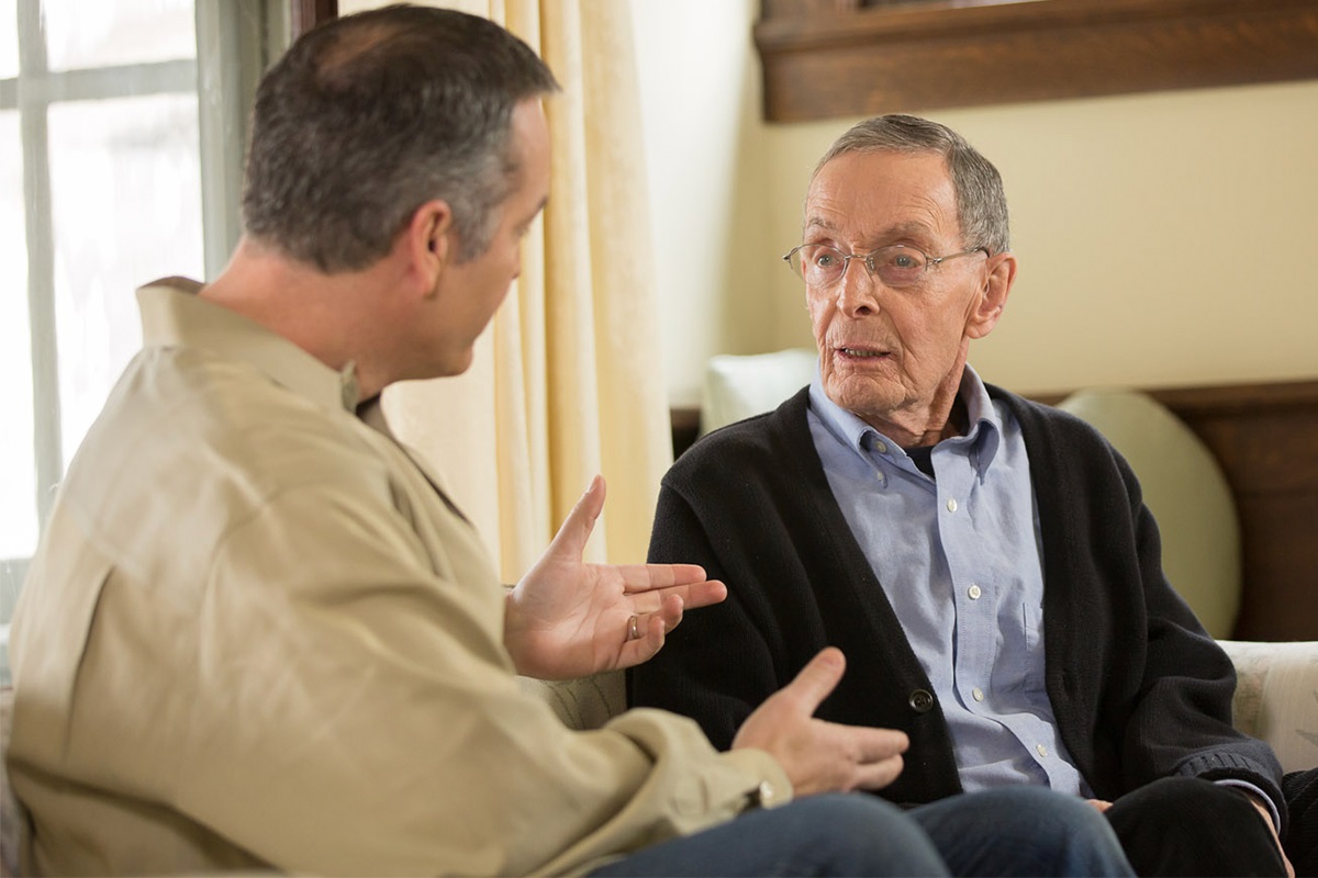 Son talking with father