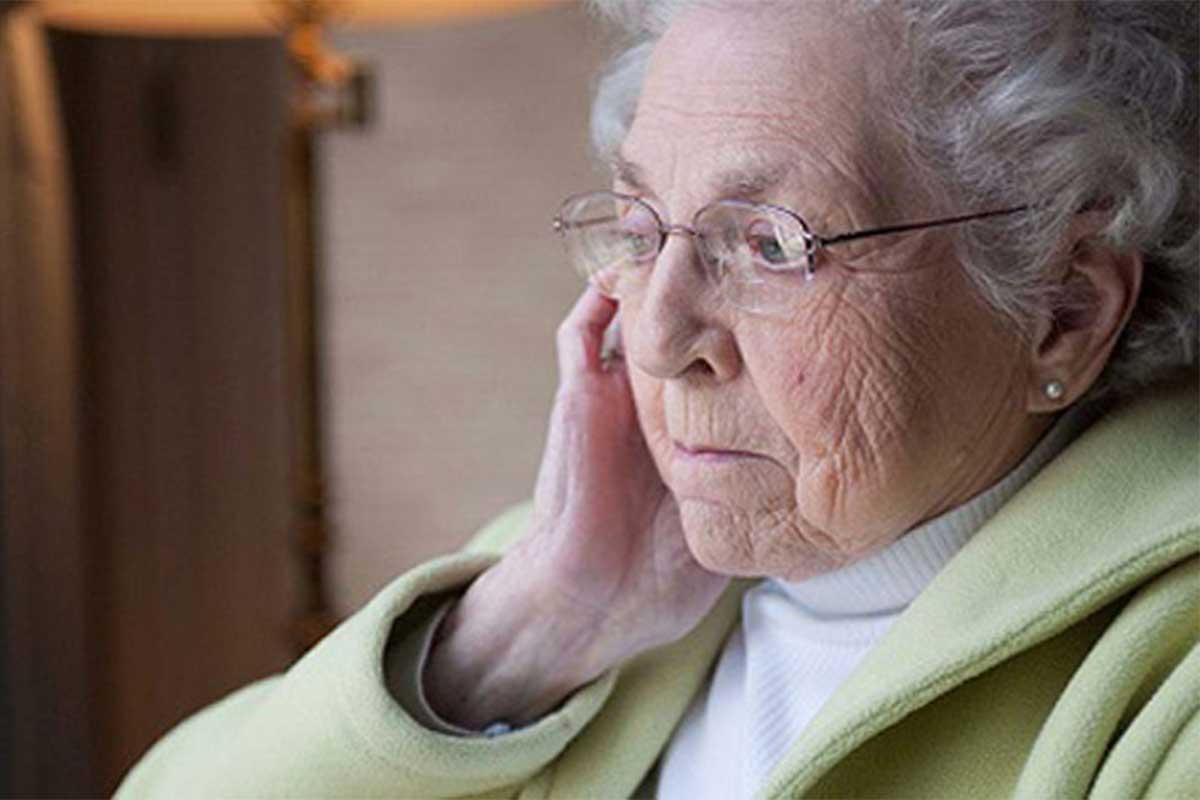 Senior woman suffering from Alzheimer's