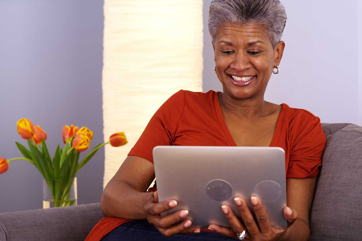 Seniors chatting online with friends