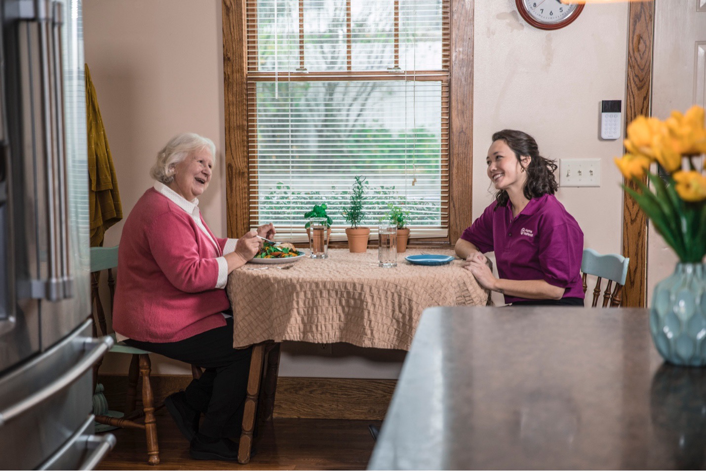 Care Professional Dementia Care Client Sitting at a Table