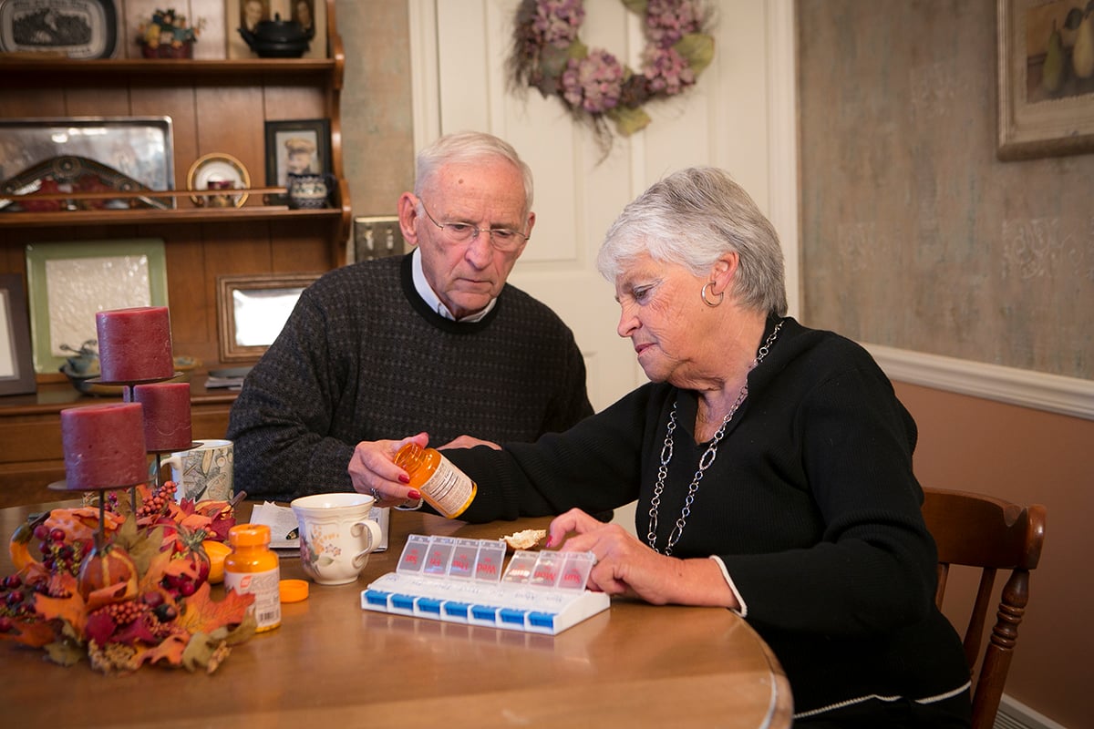 Senior couple sitting at a table