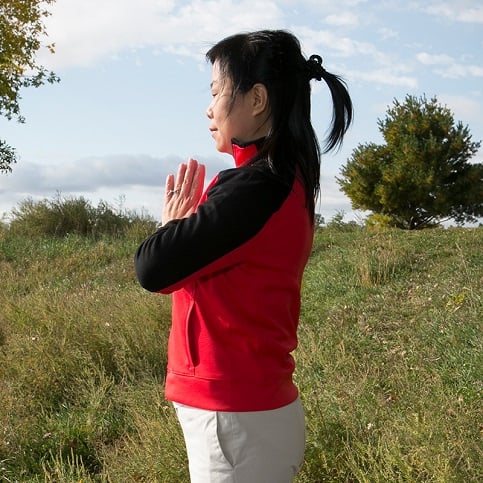 meditating in an open field