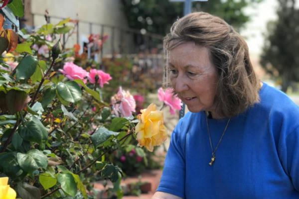 Woman with dementia outside in garden